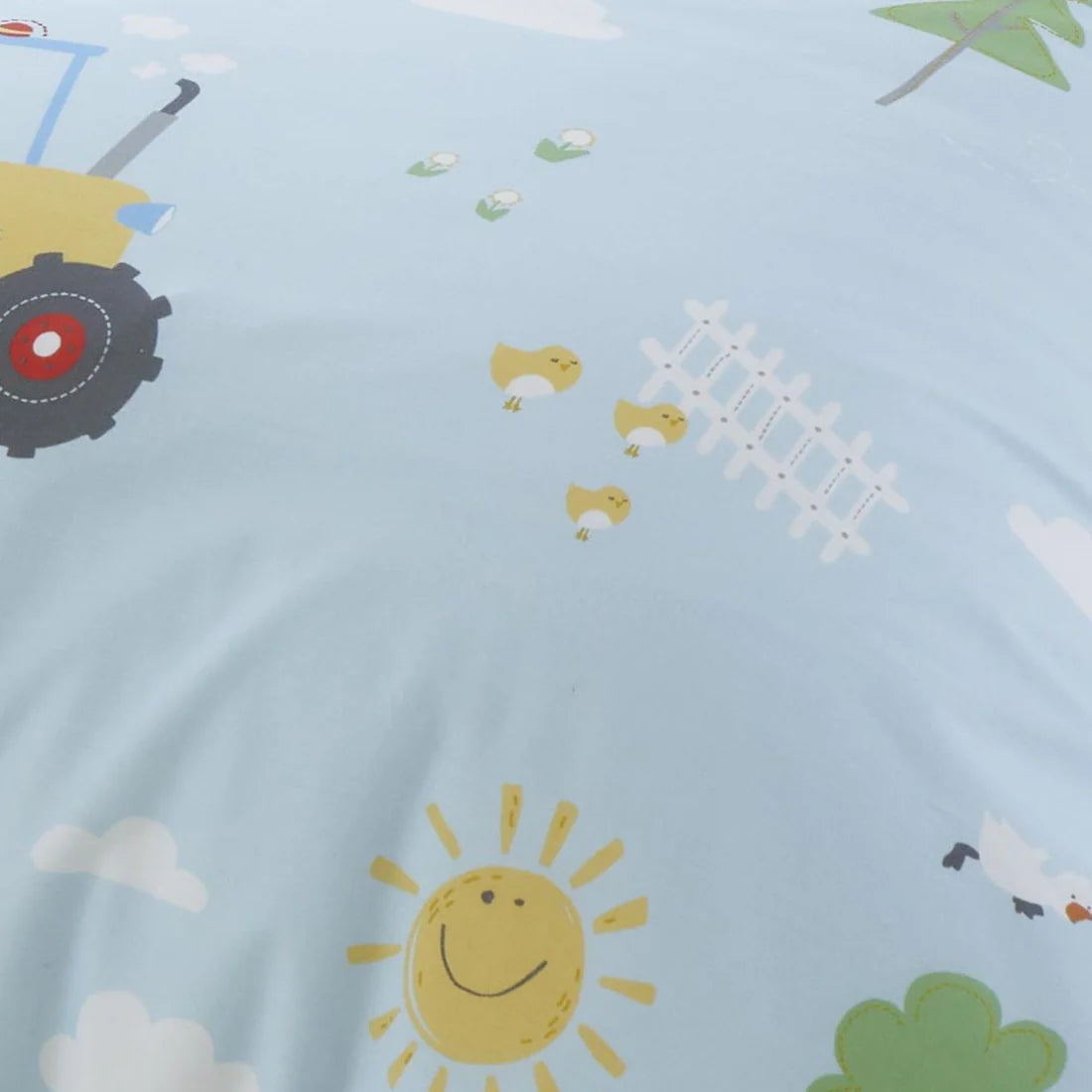 Bedlam Farmyard Friends duvet cover set in blue featuring farm animals, tractors and reversible striped design