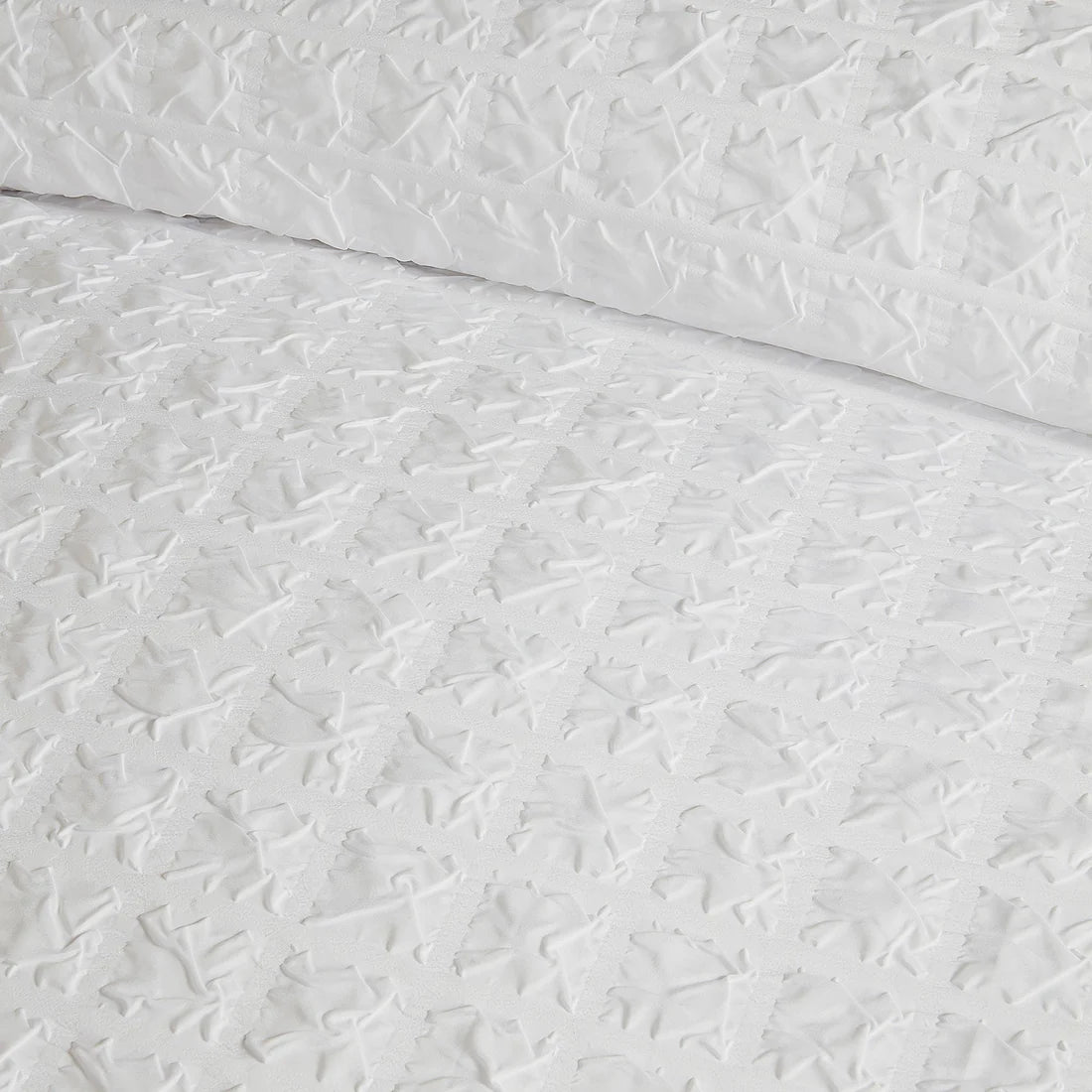 Serene Embossed Grid duvet cover set in white with textured geometric pattern and soft easy-care fabric