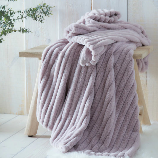 Appletree Morritz faux fur throw in mauve with luxurious soft texture and elegant home styling