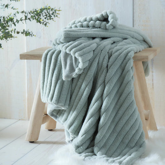 Appletree Morritz ribbed throw in green with soft luxury texture and cosy home styling