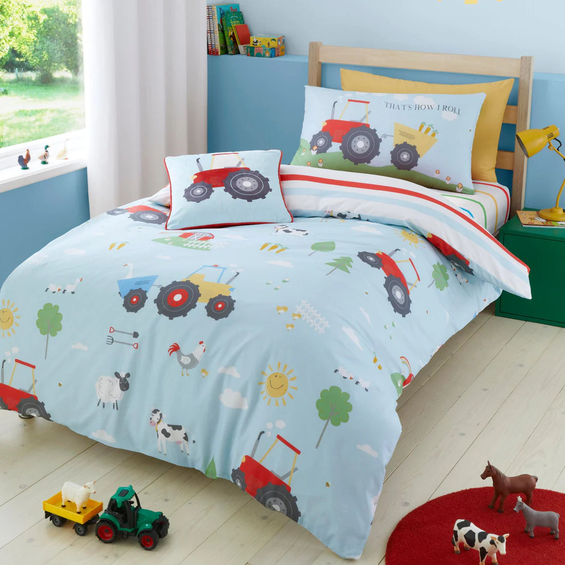 Bedlam Farmyard Friends duvet cover set in blue featuring farm animals, tractors and reversible striped design