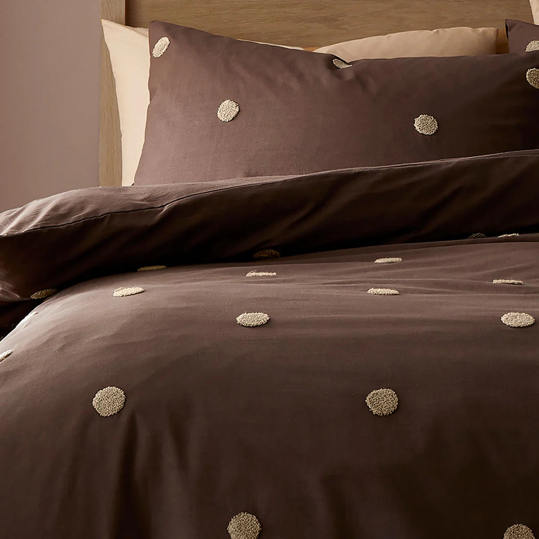 Appletree Dot Garden duvet cover set in chocolate with tufted polka dot detailing and 100% cotton fabric