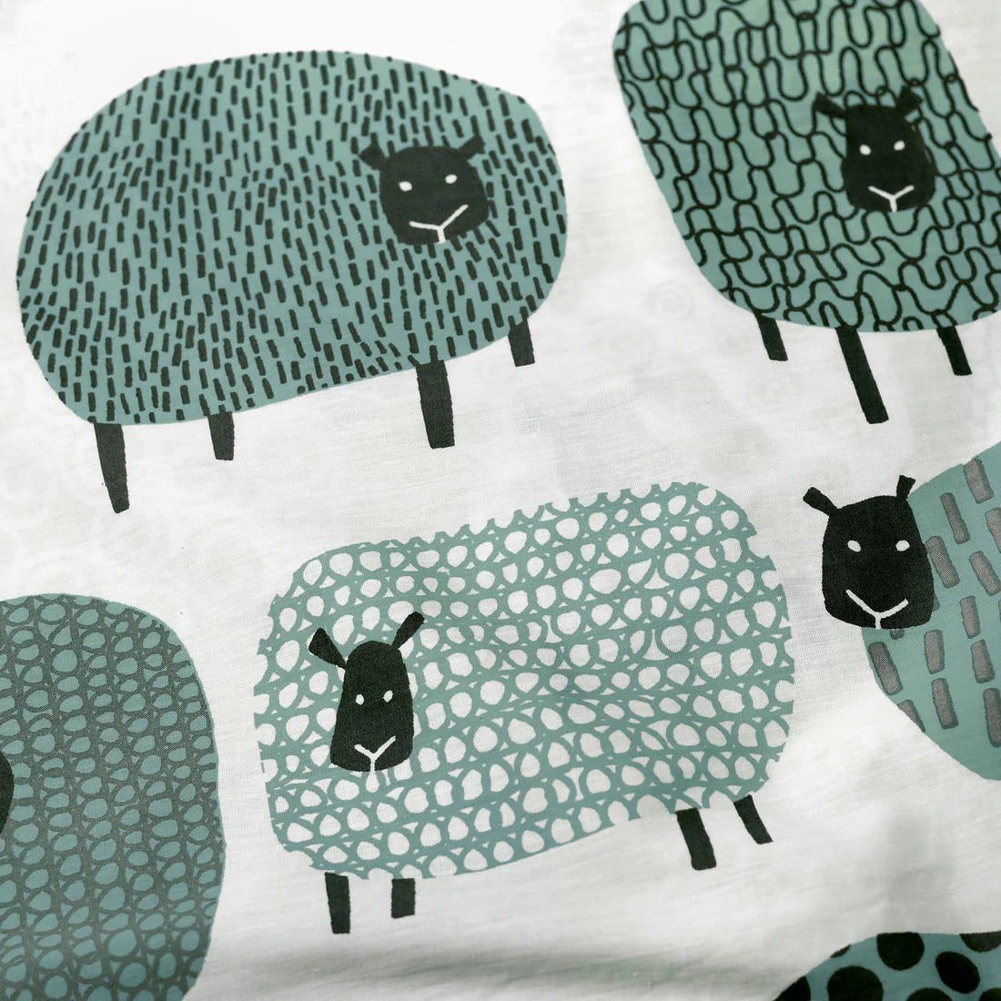 Fusion Dotty Sheep duvet cover set in duck egg featuring playful sheep design and soft polycotton fabric
