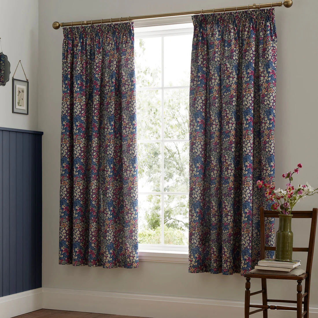 Dreams & Drapes Bessie pencil pleat curtains in navy with floral print and matching tiebacks