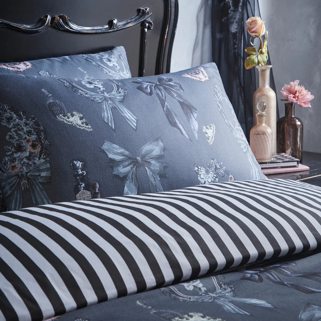 Fusion Bows Noir gothic bow duvet cover set with floral details and reversible striped grey bedding