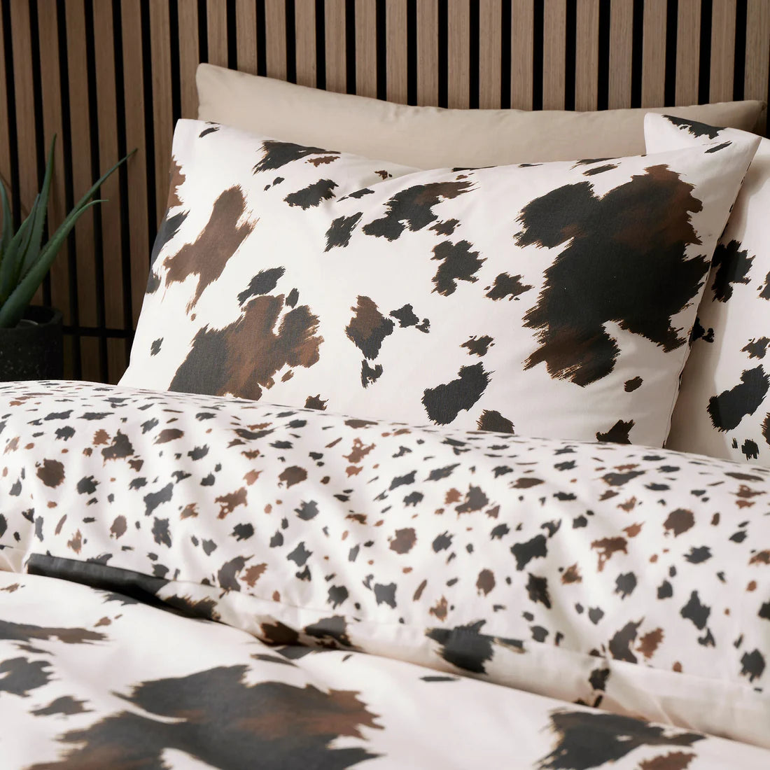 Fusion Cow Print duvet cover set with reversible cowhide pattern bedding in natural tones