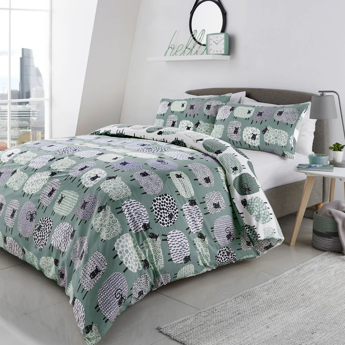 Fusion Dotty Sheep duvet cover set in duck egg featuring playful sheep design and soft polycotton fabric