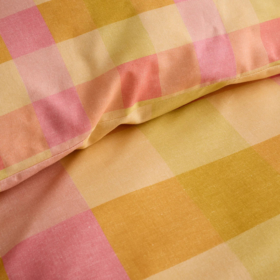 Fusion Block Check duvet cover set with oversized reversible orange and peach check bedding
