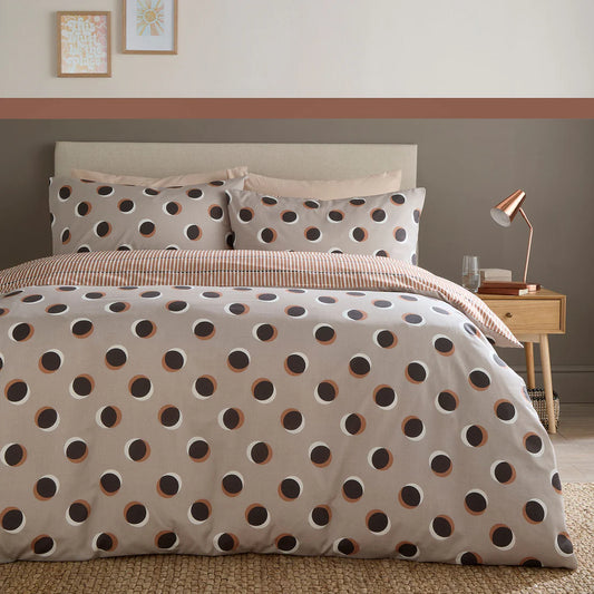 Fusion Polka Spot duvet cover set in natural with oversized retro polka dots and reversible stripe design