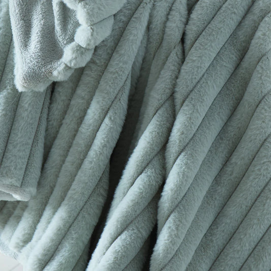 Appletree Morritz ribbed throw in green with soft luxury texture and cosy home styling