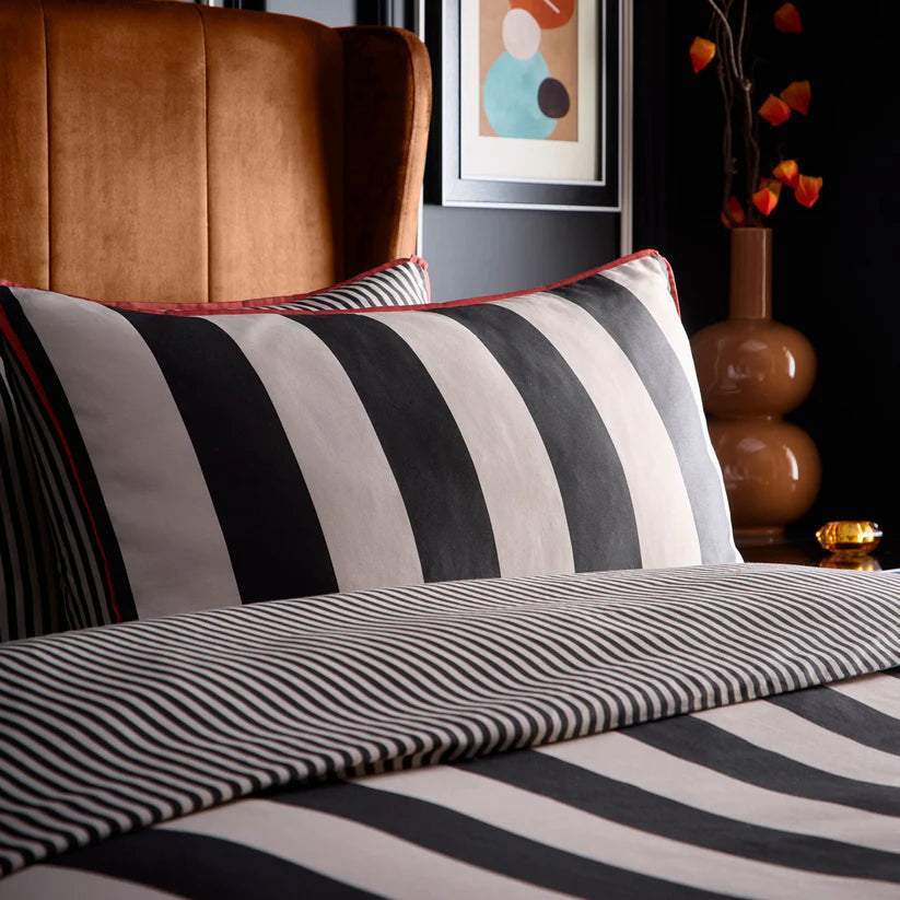 Laurence Llewelyn-Bowen Festivo Circus Stripe duvet cover set with black striped cotton sateen bedding