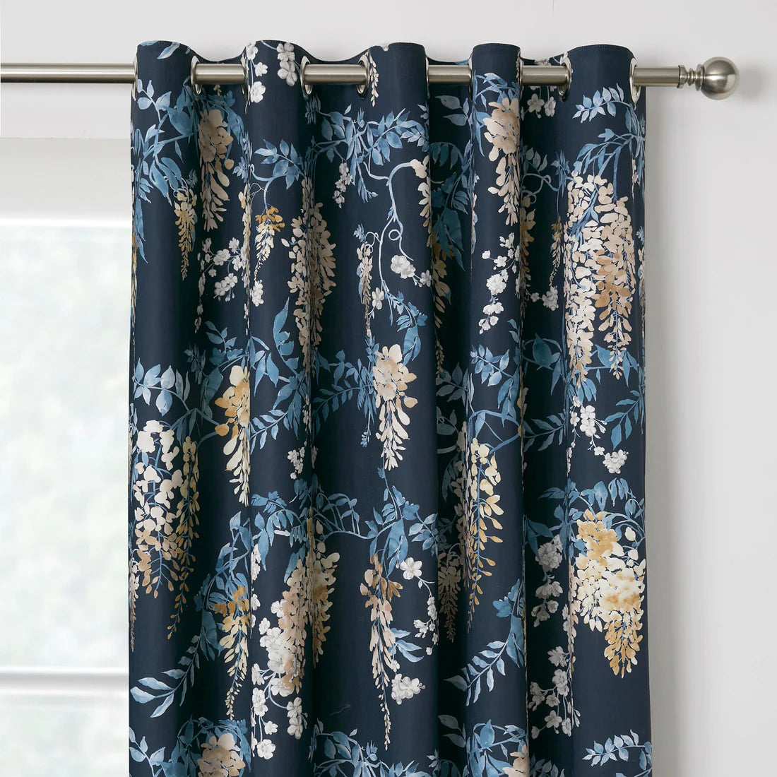 Dreams and Drapes Wisteria eyelet curtains in navy with elegant cascading floral design