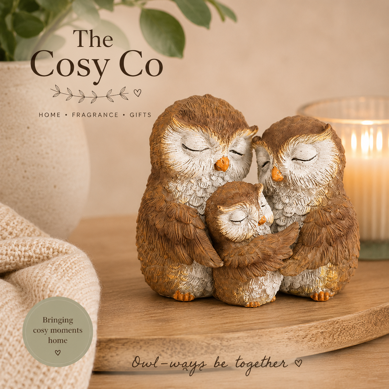 Owl family ornament featuring two parent owls and baby owl embracing in a sentimental family figurine