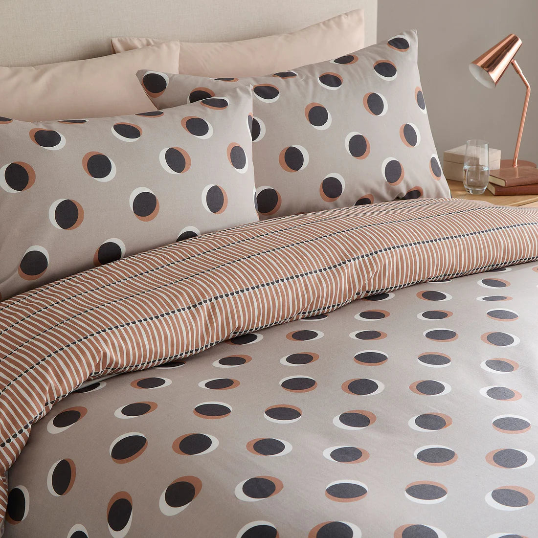 Fusion Polka Spot duvet cover set in natural with oversized retro polka dots and reversible stripe design