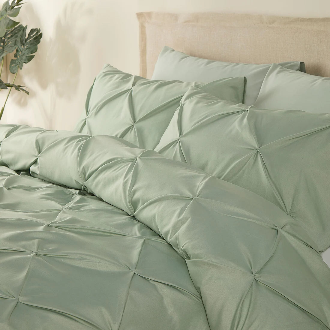 Serene Lara duvet cover set in steel and sage featuring elegant ruched texture and contemporary styling