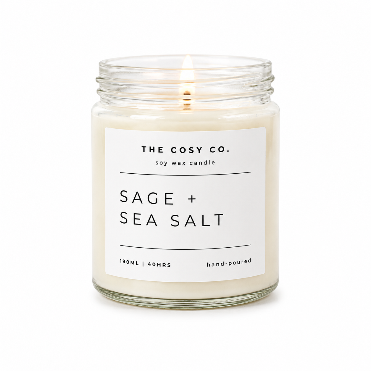 The Cosy Co Sage and Sea Salt soy candle in clear glass jar with fresh coastal fragrance