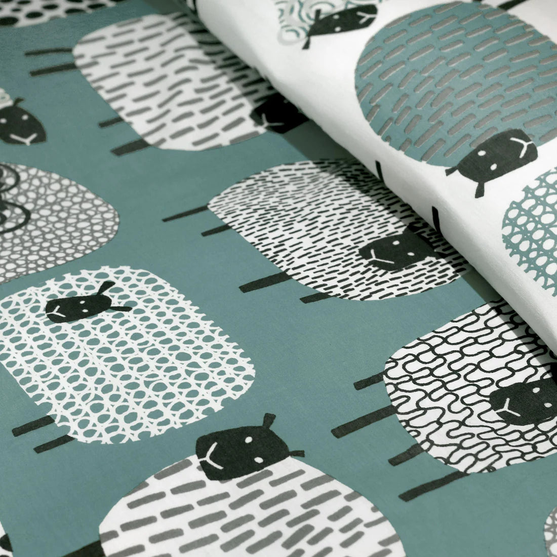 Fusion Dotty Sheep duvet cover set in duck egg featuring playful sheep design and soft polycotton fabric