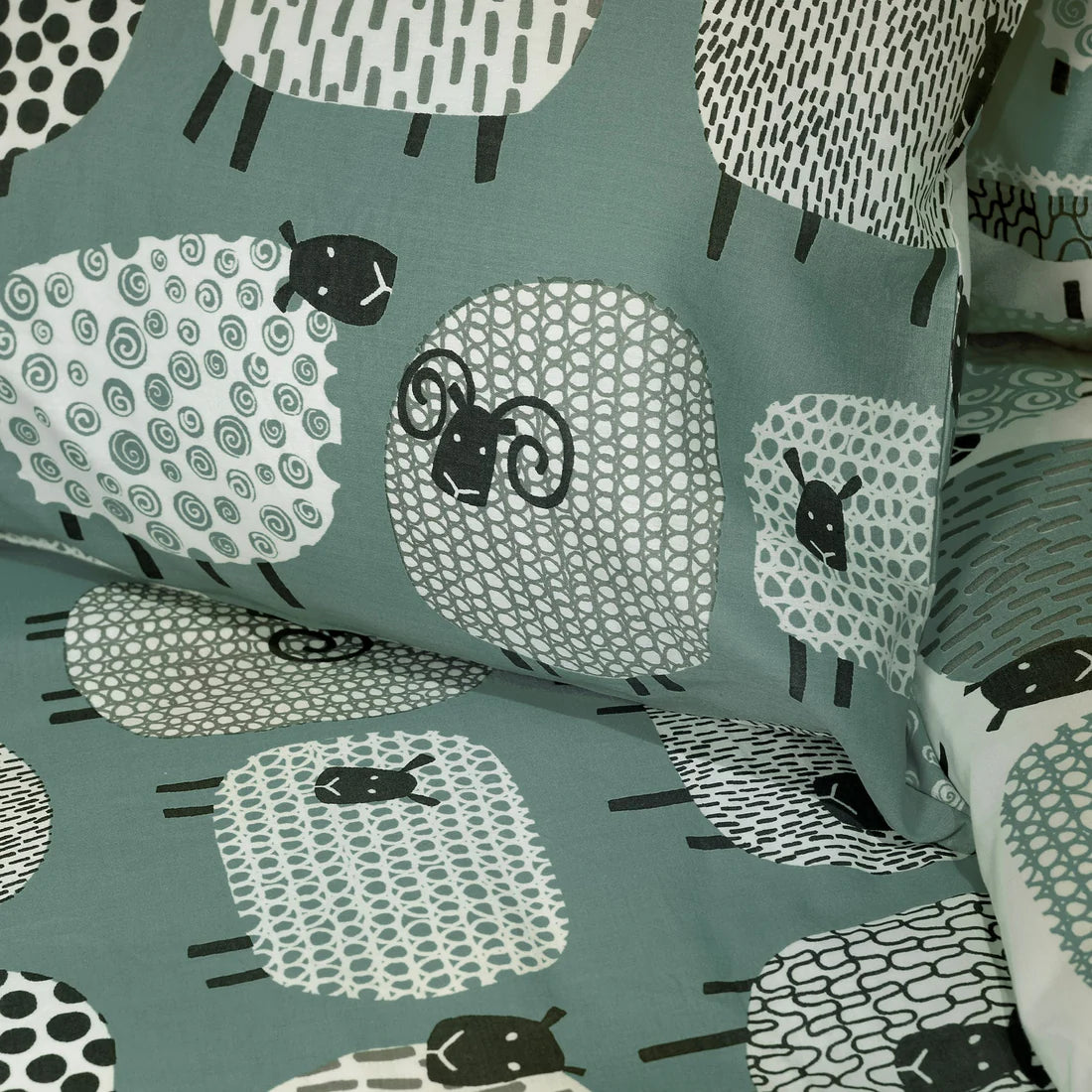 Fusion Dotty Sheep duvet cover set in duck egg featuring playful sheep design and soft polycotton fabric