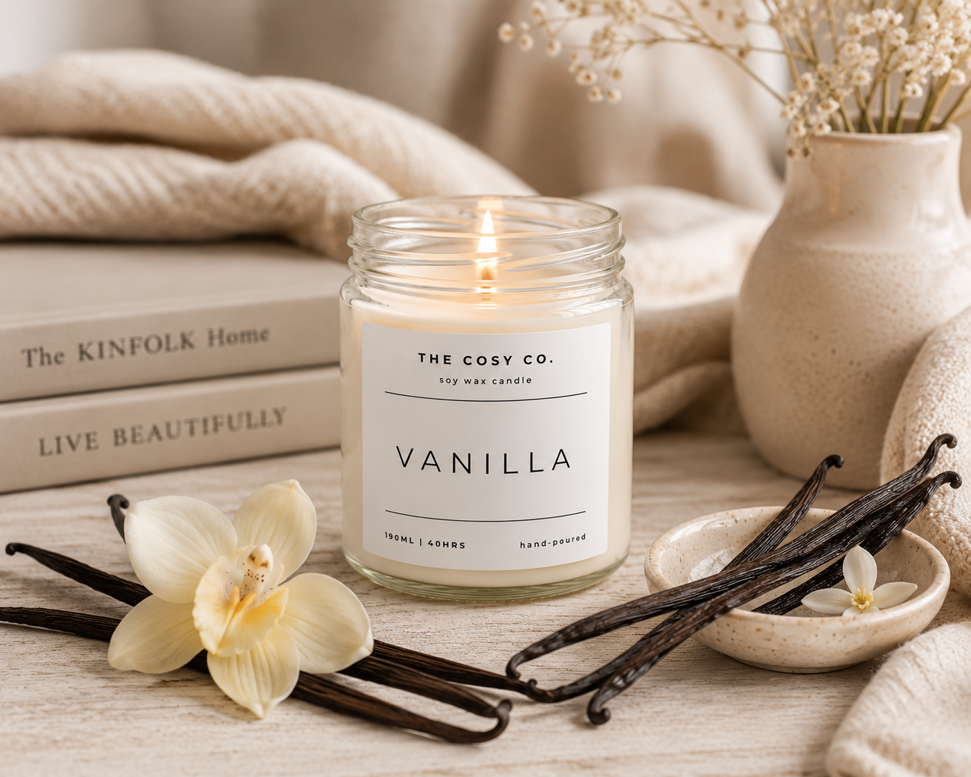 The Cosy Co Vanilla Comfort soy candle in clear glass jar with warm vanilla pod fragrance and floral notes