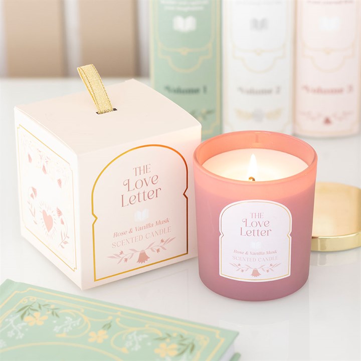 The Love Letter Rose and Vanilla Musk scented candle with romantic gift-ready packaging