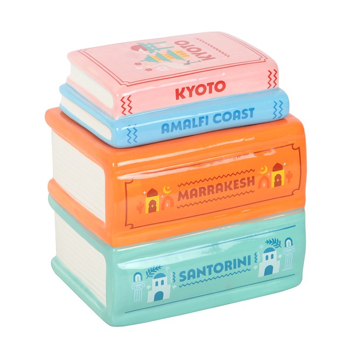 Travel Book Stack ceramic oil burner and wax warmer inspired by colourful travel guide books